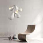 Lampe led blanche suspendue au design nordique créatif, suspendu au dessus d'une chaise